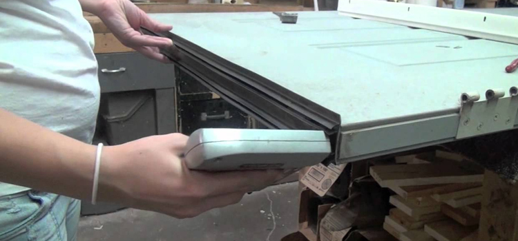 damaged steel door repair Ives Estates